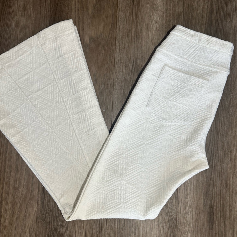 White Textured Boot-Cut Bell Bottom Flare Pants with Subtle Pattern - Picture 3 of 15